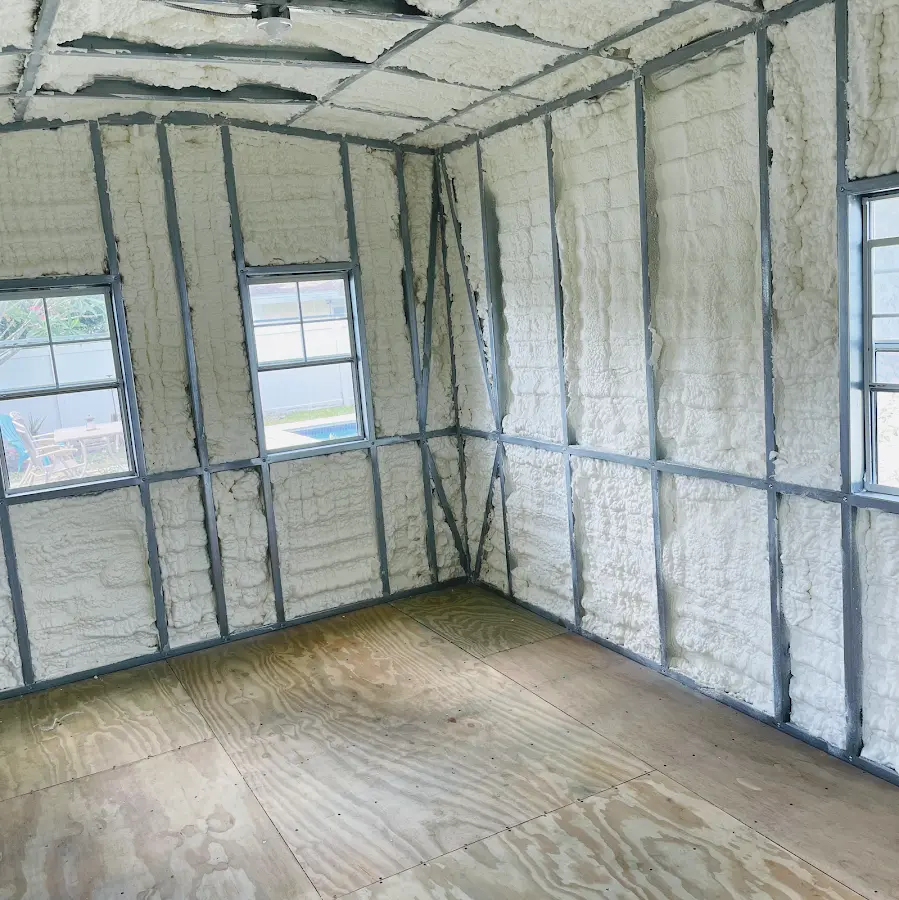 Closed-cell spray foam insulation applied to wall cavities in a residential project in Kaneohe